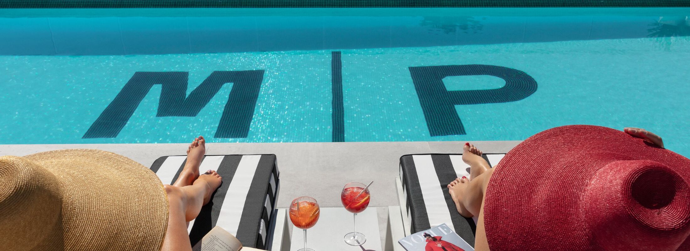 Two ladies enjoying the rooftop pool at Manly Pacific