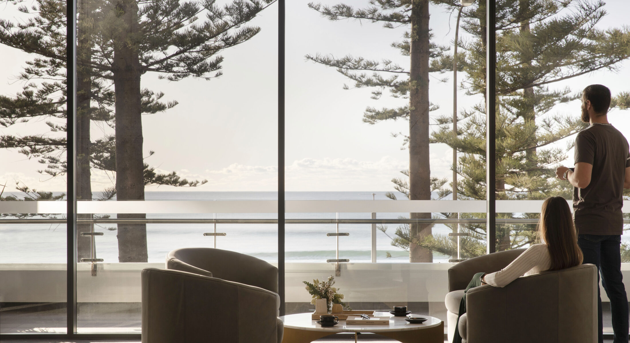 man and woman enjoy the view in the function area of Manly Pacific